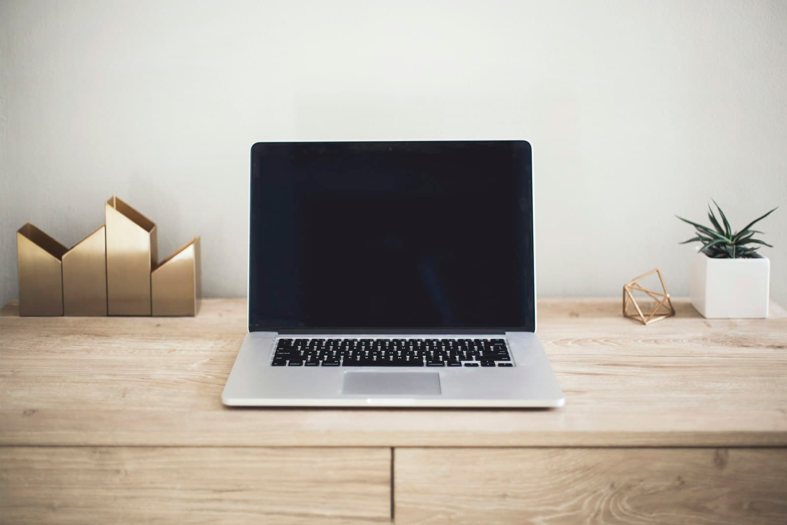Laptop open on a desk, representing eLearning course and training module voiceover